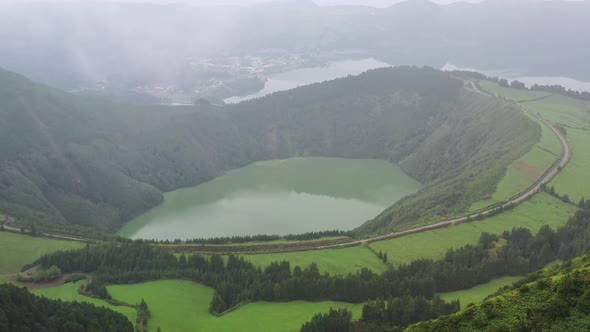 Aerial view of a small lake on hilltop near Capelas, Azores Islands, Portugal.