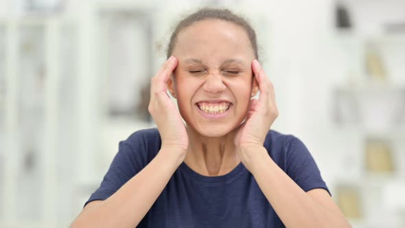 Portrait of Exhausted African Woman Having Headache