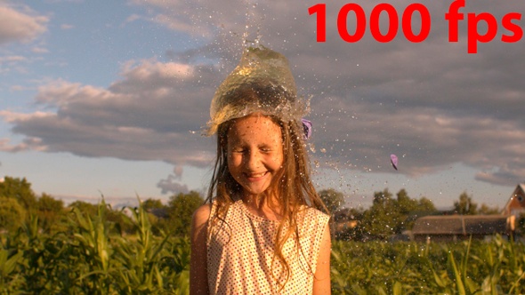 Water Balloon Splash On Little Girl's Head 4k