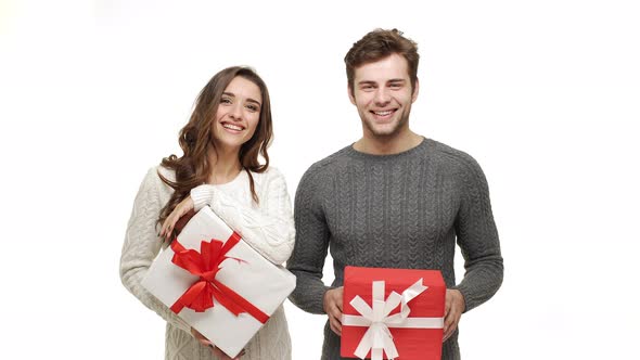  Young Couple in Sweaters Enjoy Dancing Celebrate for Christmas Fun Together Feeling Attraction