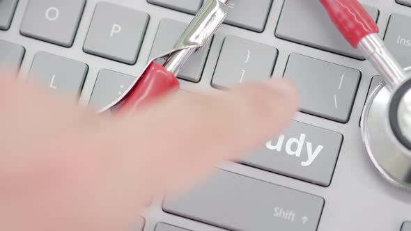 STUDY Key Being Pressed on a Computer Keyboard