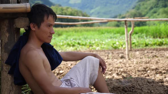 Asian Farmer Despondent