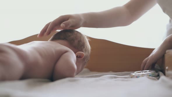 Professional Pediatrician Practices Infant Boy Massage