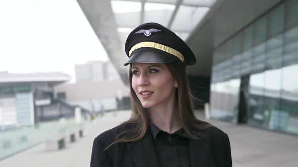 Young Attractive Professional Woman Pilot Succeed in Aviation Business