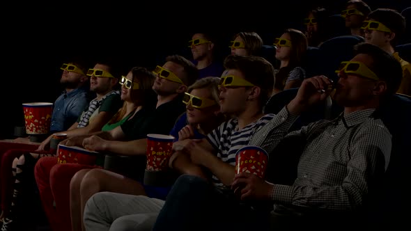 Young People Watch Movies in Cinema: Horror in 3D