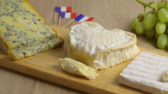  French cheese platter with four different types of cheese close up