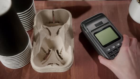 AfricanAmerican Businessman Paying with Nfc Phone Credit Card in Cafe or Supermarket