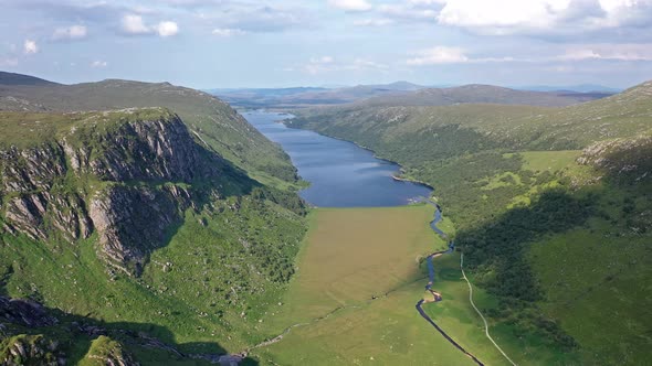 Aerial View of the Glenveagh National Park with Castle Castle and Loch in the Background - County