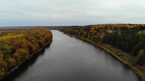 Aerial View. Flying Over the River. Beautiful Autumn Day