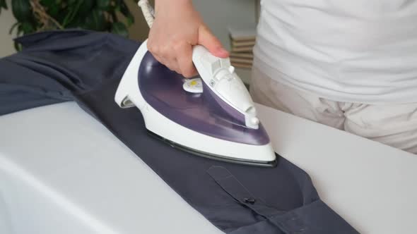 The Process of Ironing and Steaming the Shirt