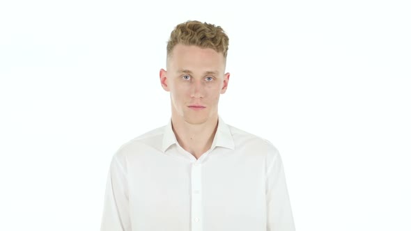 Portrait of Young Businessman Looking in Camera