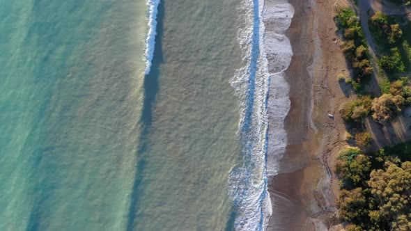 Flying Along Sea Coast Overhead View