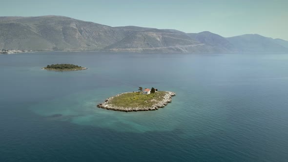 Aerial view of the St. Athanasios island in the Gulf of Corinth, Greece.