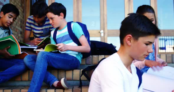 Students studying in school campus