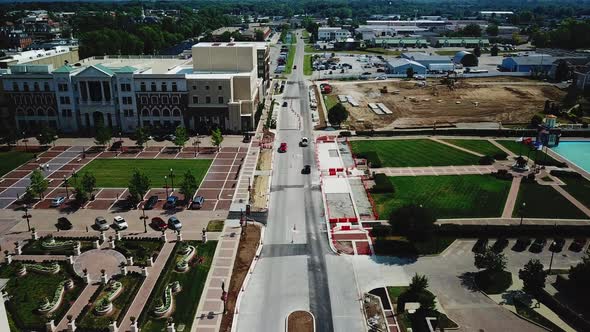 4k Aerial View of Drone flyover of Carmel arts district outside Indianapolis on bright sunny day