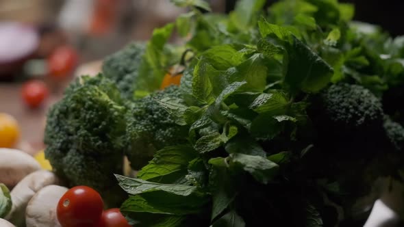 Fresh Greens and Veggies on the Table Close Up