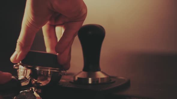 Barista Making a Cup of Strong Coffee in a Coffee Machine