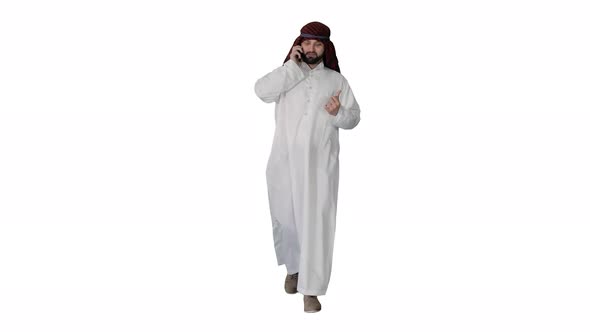 Arab Sheikh Making a Call Walking on White Background