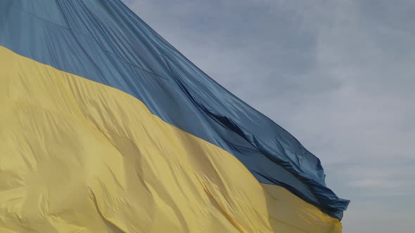 Flag of Ukraine. Slow Motion. Kyiv. Aerial, Flat, Gray