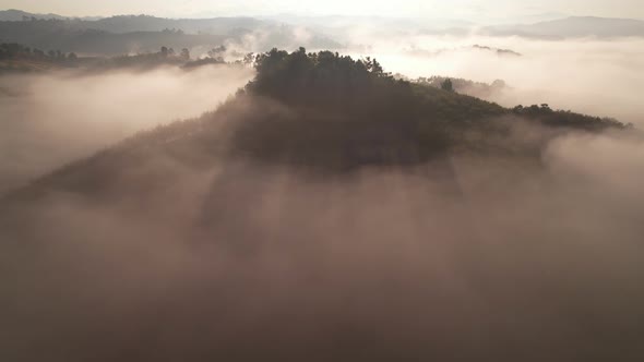 4K Aerial Flying Above Fog at Sunrise