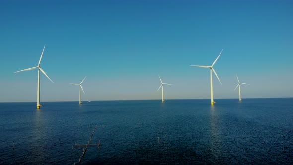 Windmill Park in the Ocean Drone Aerial View of Windmill Turbines Generating Green Energy Electric