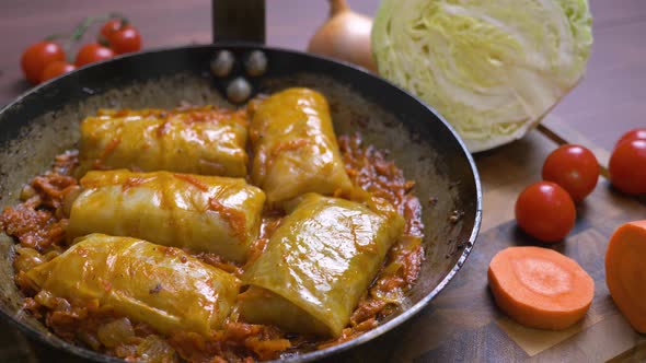 Cooking Cabbage Rolls. Hand Held Studio Shot