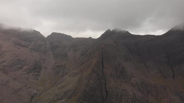 Panoramic drone shot of majestic scotish mountains in fairy pools location. Isle of skye scotland. G