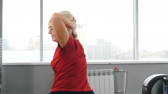 Senior Woman Training in Gym