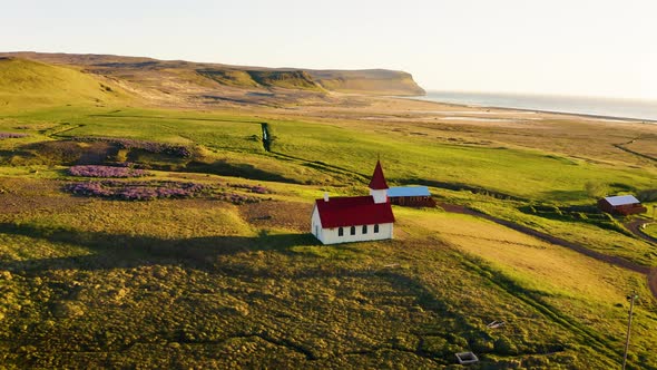 Sunset at the Breidavik Church in Westfjords Iceland