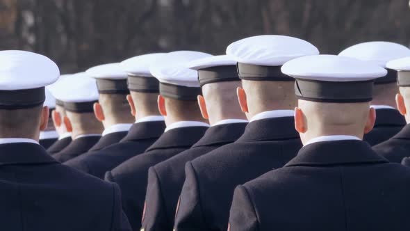 White Caps Are Dressed for Soldiers, Stand in Line and Look at the Commander.