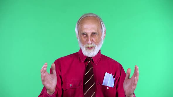 Portrait of Happy Old Aged Man 70s Looking at the Camera Then Celebrating Victory Triumph, Isolated