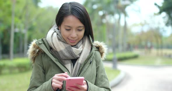 Woman use of smart phone at outdoor