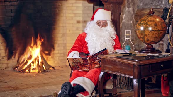 Santa reading magic book.