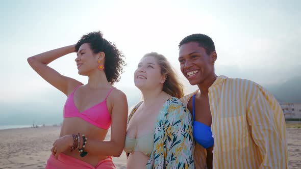 young women having fun on the beach