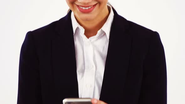 Businesswoman using mobile phone