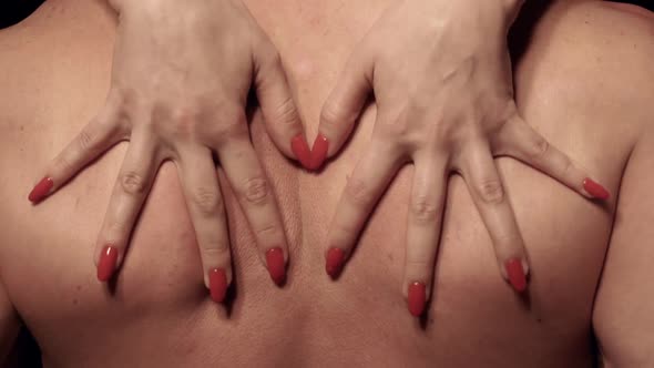 Woman's Hands on Males Body