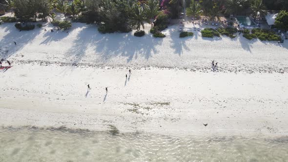 Zanzibar Tanzania  People Play Football on the Beach Slow Motion