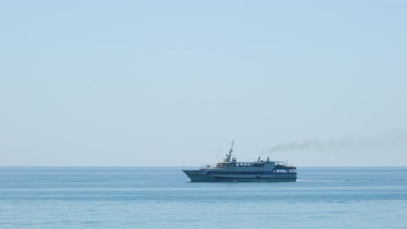 the Ship is Moving Along the Horizon of the Sea