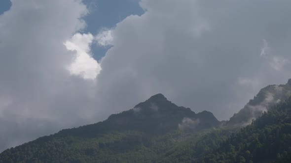 Clouds Hide Mountain Peak Time Lapse