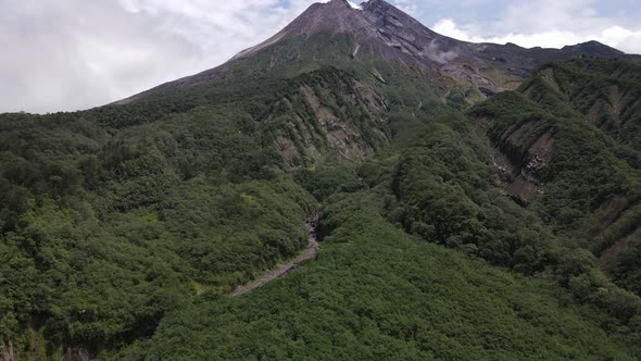 Aerial view of active Merapi mountain with clear sky in Indonesia