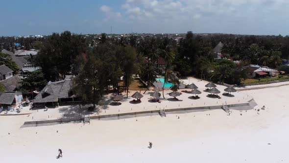 Long Ocean Low Tide with Bared Bottom in Shallow Water Zanzibar Aerial View