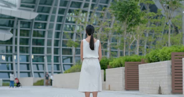 Woman look around in the station