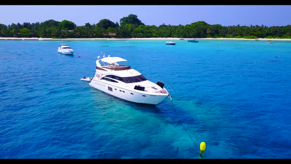 Aerial top down seascape of exotic island beach time by aqua blue sea and white sandy background of 