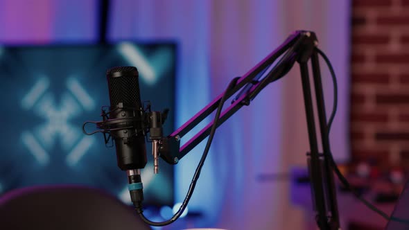 Selective Focus on Professional Boom Arm Microphone Stand Used for Recording Voice in Online Podcast