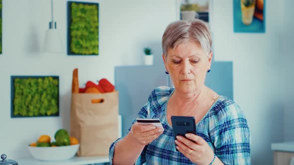 Senior Woman Paying Online