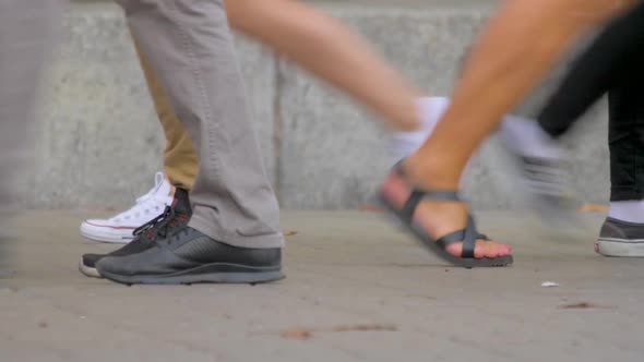 People's Legs Going on the Street. Diversity of People. Group of People Walk Down the Street. People