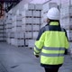 Follow Footage of Employees Famale Warehouse Worker Engineer in Hard Hat Working - VideoHive Item for Sale