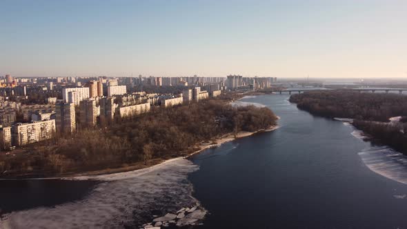 Left bank of the city of Kiev. Rusanovsky district. winter, sunset. aerial view