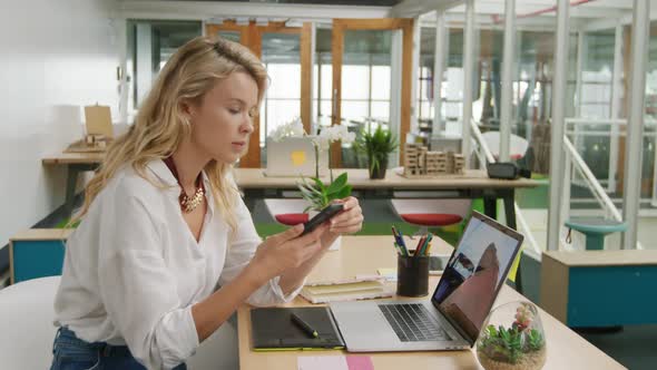 Young woman working in a creative office