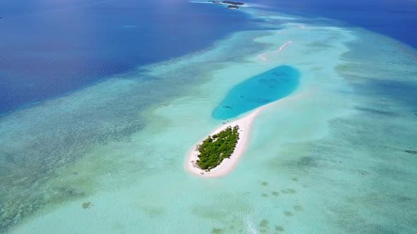 Drone aerial travel of tourist beach by blue lagoon with sand background